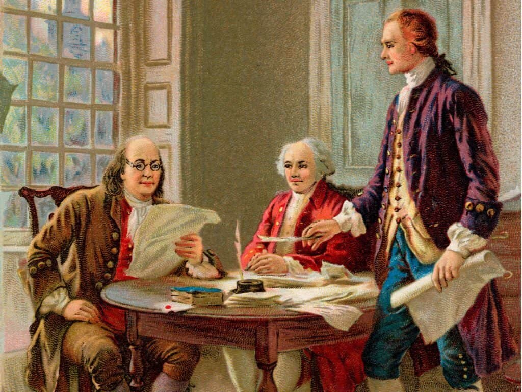 Benjamin Franklin, John Adams and Thomas Jefferson reviewing a draft of t he Declaration of Independence.