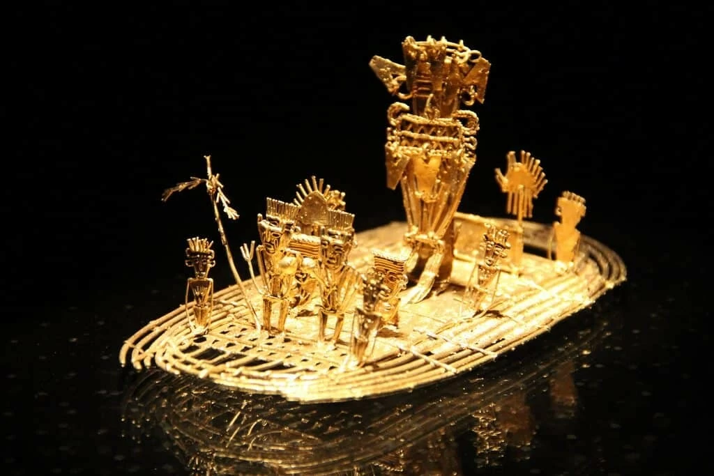 Representation of the “Gilded One” covering his body in gold dust and offering treasures to the goddess in Lake Guatavita. Was this the origin of the legend of El Dorado?