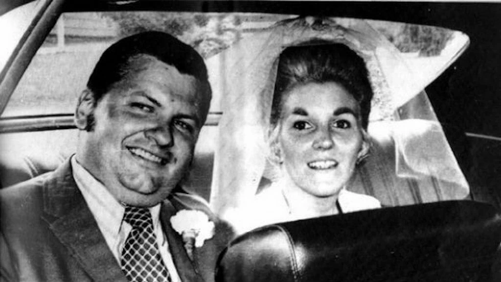 John on his wedding day with Carole Hoff.