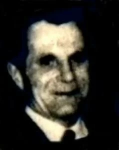 Zigmund Adamski's body was found atop a coal heap with no explanation.