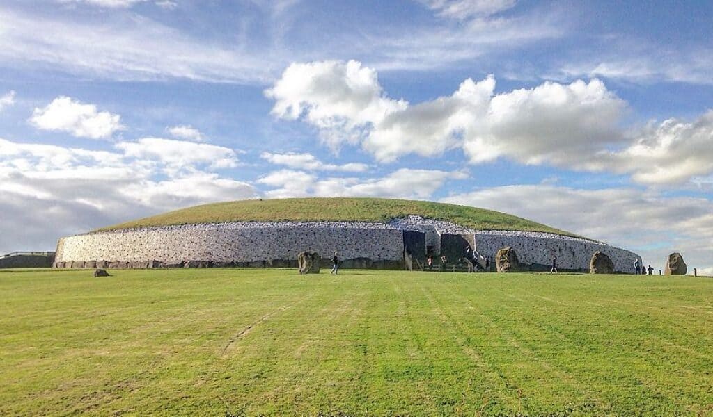 Newgrange from the front. Source: Wikimedia Commons, Tjp Finn.