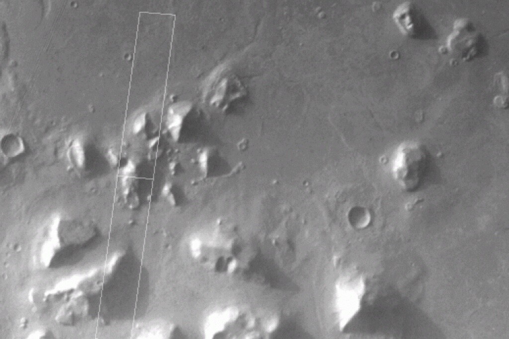 Cydonia (The City), Mars. The famous face of Mars in the upper right corner. Mars Global Surveyor Mars Orbiter Camera Release, Great Galactic Ghoul.