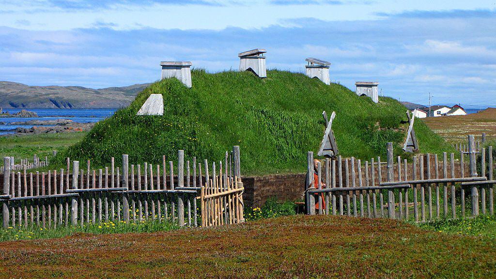 Recreated Viking longhouse at L'Anse aux Meadows, Newfoundland. Source: Wikimedia Commons, Gordon E. Roberts 2010.