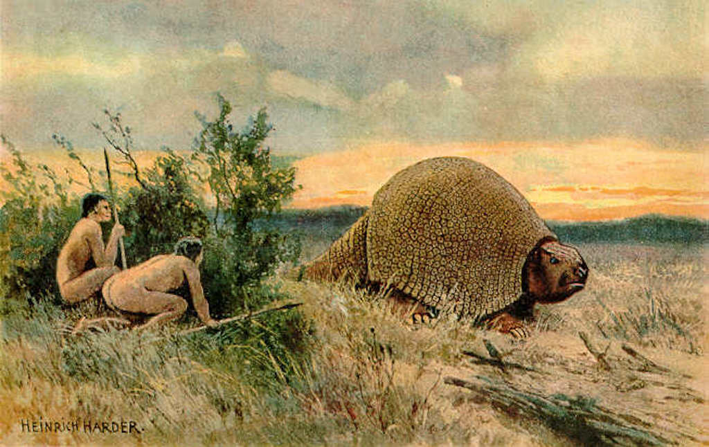 Paleo-Indians hunting a glyptodont.