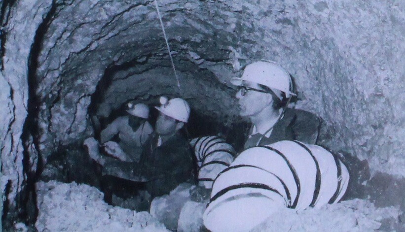 John Atkinson in a tunnel inside the hill. Image: Alexander Keiller Museum.