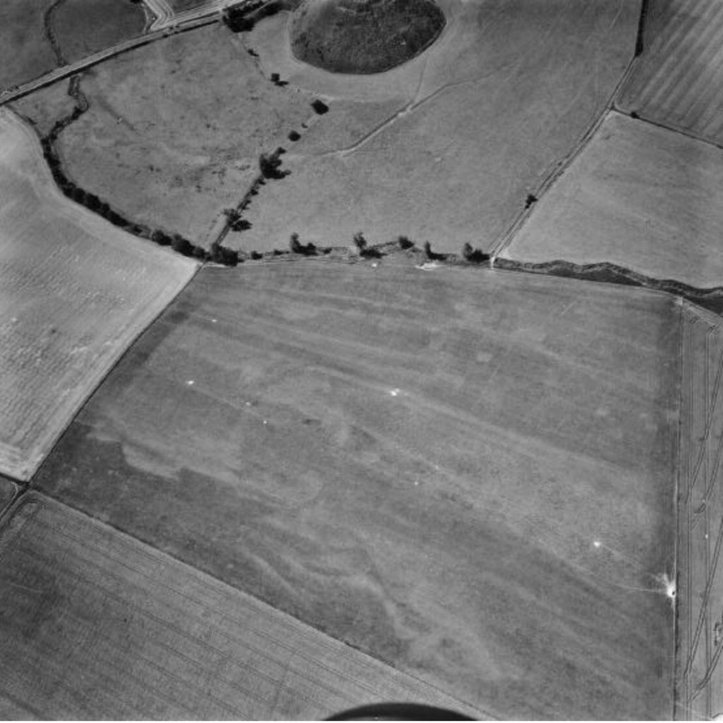 Traces of a Roman village is visible towards the center of the photo.