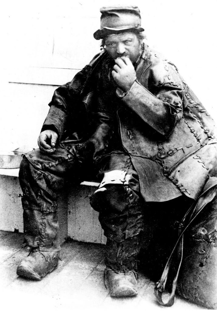 The mysterious man wore 60 pounds of patched leather.